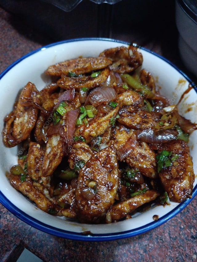 Tasty Chilli Lotus Stem cooked by COOX chefs cooks during occasions parties events at home