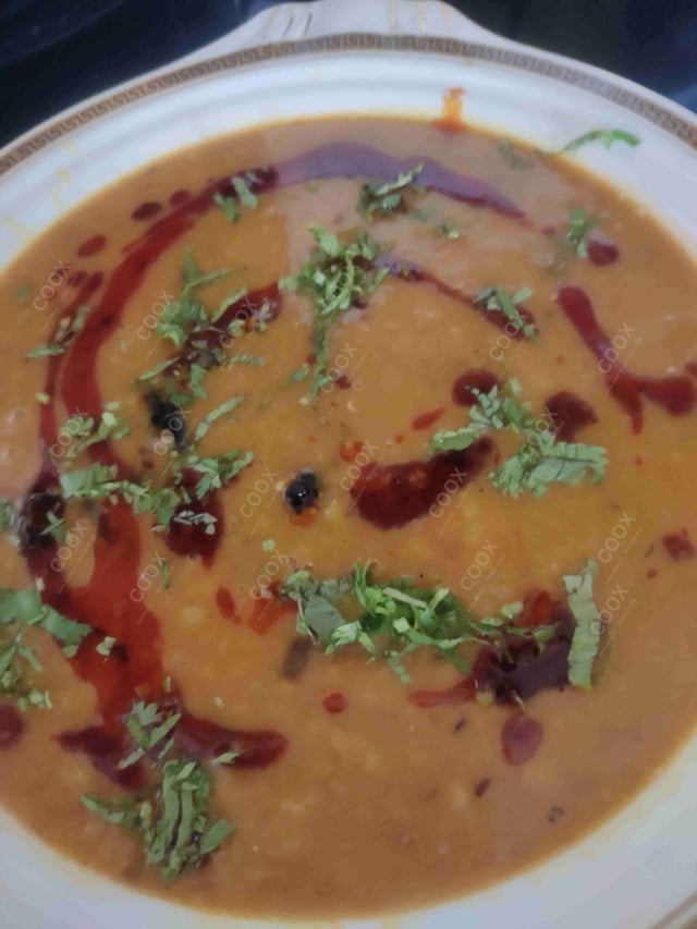 Tasty Moong Dal cooked by COOX chefs cooks during occasions parties events at home