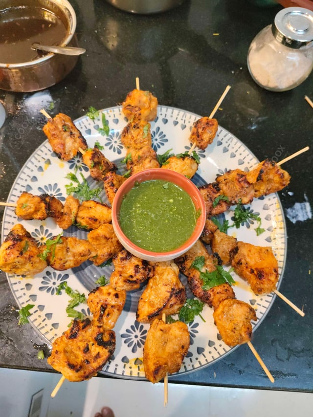 Tasty Chicken Tikka cooked by COOX chefs cooks during occasions parties events at home
