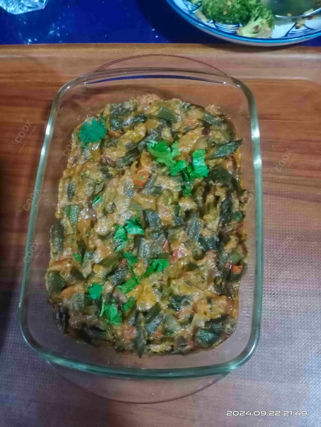 Tasty Bhindi do Pyaza cooked by COOX chefs cooks during occasions parties events at home