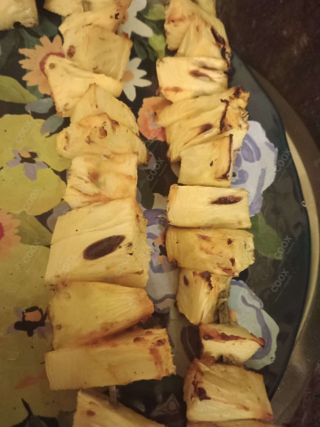 Tasty Tandoori Pineapple cooked by COOX chefs cooks during occasions parties events at home