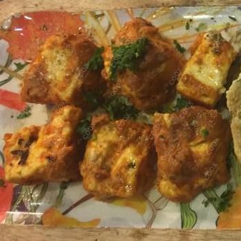 Tasty Paneer Tikka cooked by COOX chefs cooks during occasions parties events at home