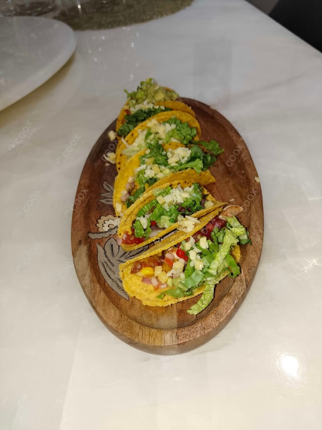 Tasty Veg Taco cooked by COOX chefs cooks during occasions parties events at home