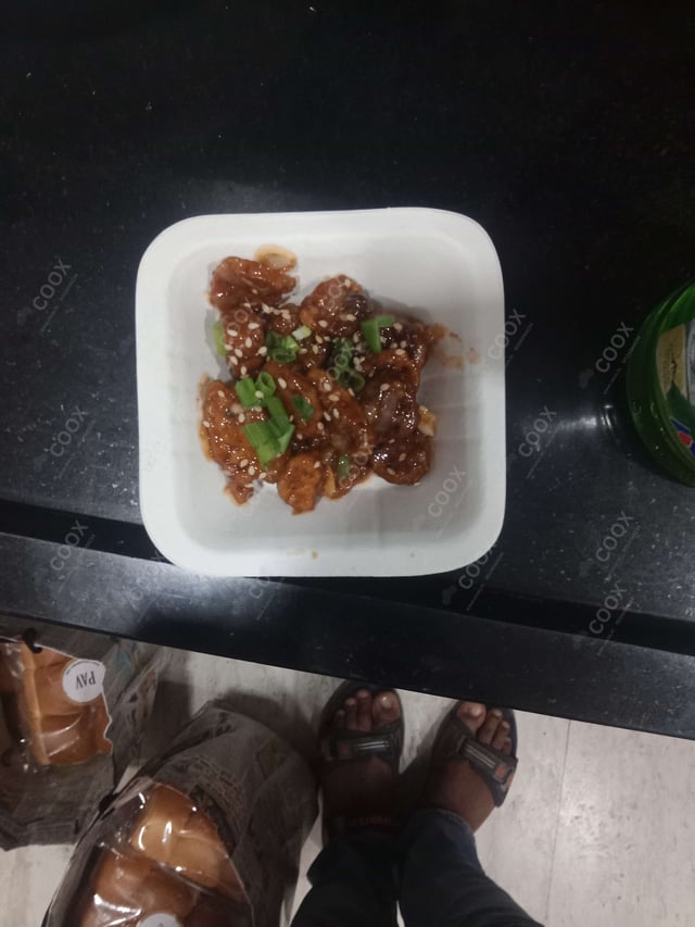 Tasty Chilli Lotus Stem cooked by COOX chefs cooks during occasions parties events at home