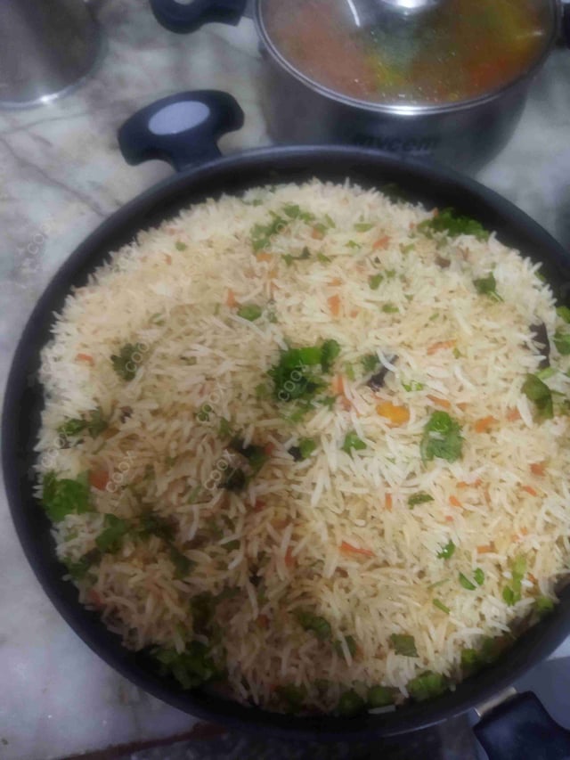 Tasty Burnt Garlic Rice cooked by COOX chefs cooks during occasions parties events at home