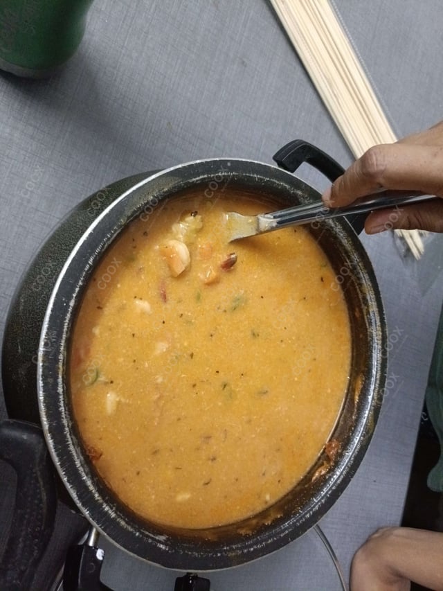 Tasty Red Thai Prawn Curry cooked by COOX chefs cooks during occasions parties events at home