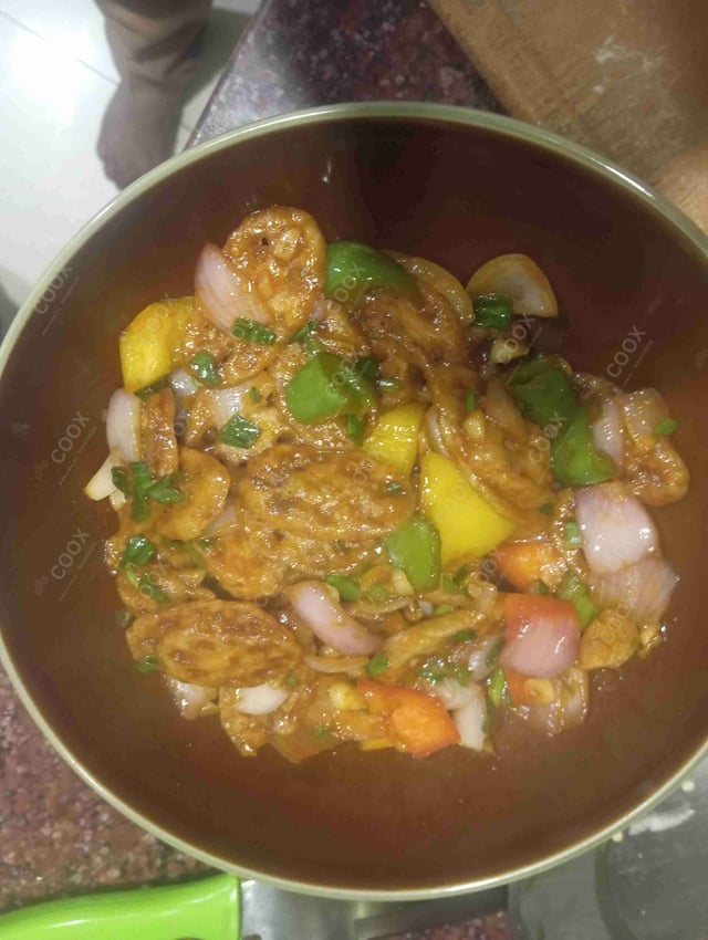 Tasty Chilli Lotus Stem cooked by COOX chefs cooks during occasions parties events at home