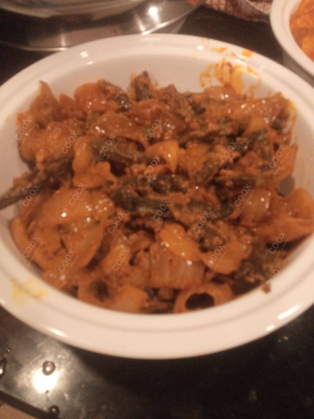 Tasty Bhindi do Pyaza cooked by COOX chefs cooks during occasions parties events at home