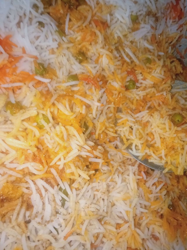 Tasty Veg Biryani cooked by COOX chefs cooks during occasions parties events at home