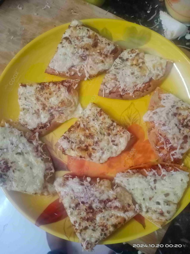 Tasty Margherita Pizza cooked by COOX chefs cooks during occasions parties events at home