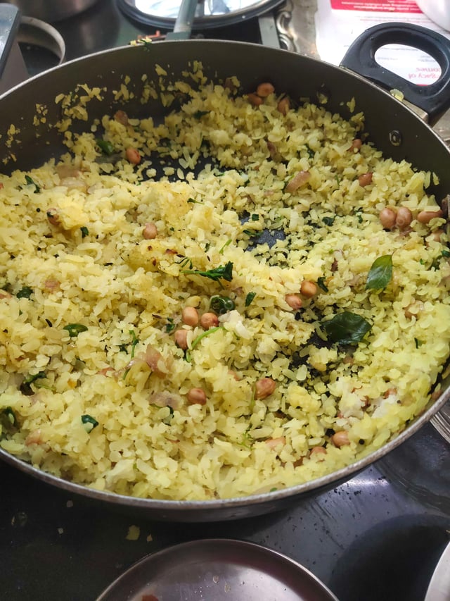 Tasty Poha cooked by COOX chefs cooks during occasions parties events at home