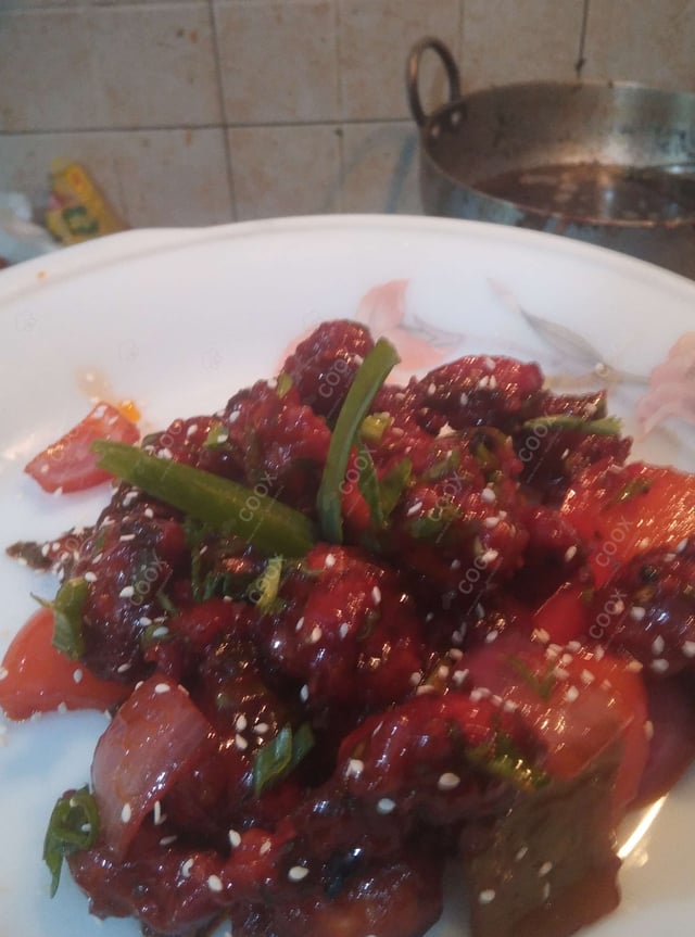 Tasty Chilli  Chicken cooked by COOX chefs cooks during occasions parties events at home