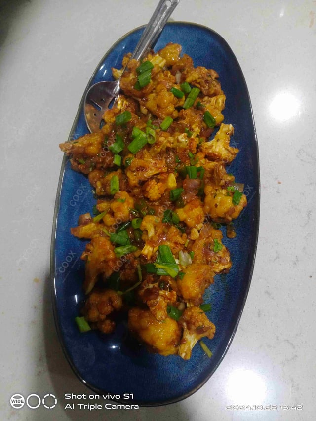 Tasty Gobi Manchurian cooked by COOX chefs cooks during occasions parties events at home