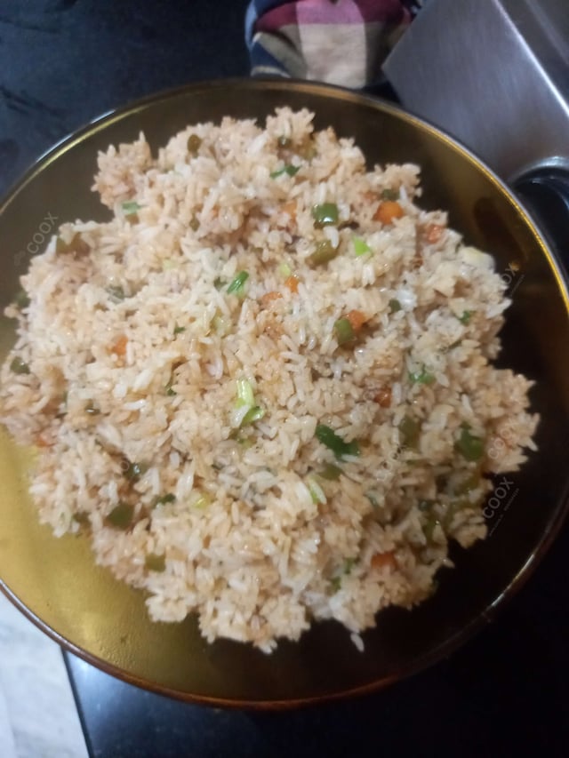 Tasty Burnt Garlic Rice cooked by COOX chefs cooks during occasions parties events at home