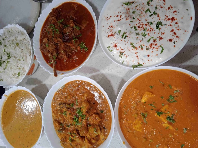 Tasty Chicken Korma cooked by COOX chefs cooks during occasions parties events at home