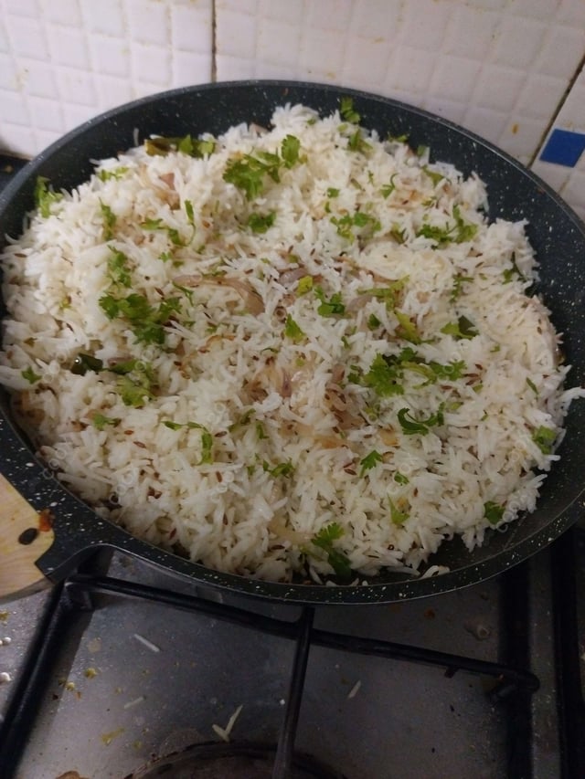 Delicious Jeera Rice prepared by COOX