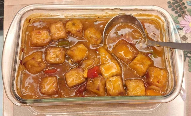 Tasty Chilli Paneer (Gravy) cooked by COOX chefs cooks during occasions parties events at home