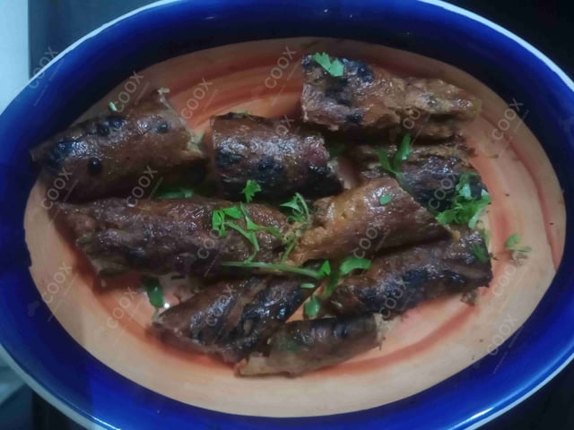 Tasty Mutton Seekh Kebab cooked by COOX chefs cooks during occasions parties events at home