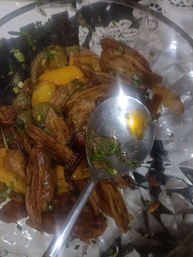 Tasty Chilli Lotus Stem cooked by COOX chefs cooks during occasions parties events at home