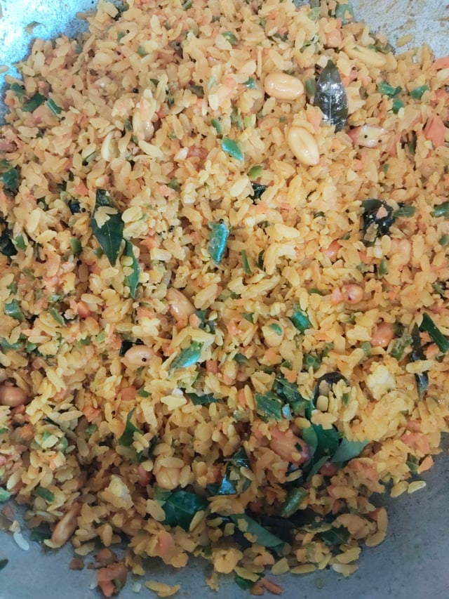 Tasty Poha cooked by COOX chefs cooks during occasions parties events at home
