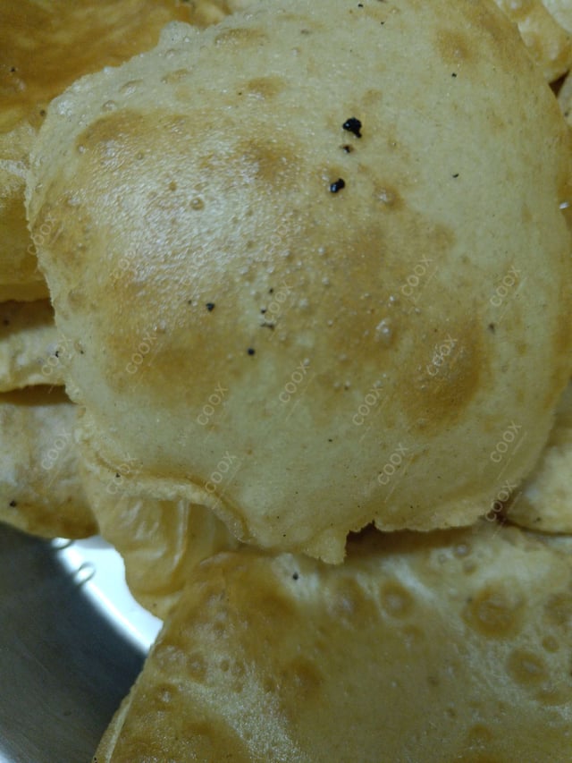 Delicious Pooris & Bedmis prepared by COOX