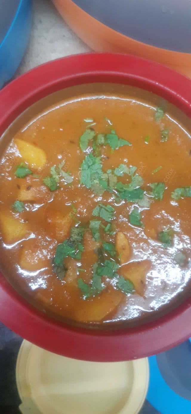 Tasty Aloo Patta Gobhi cooked by COOX chefs cooks during occasions parties events at home