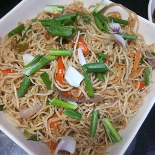 Tasty Veg Hakka Noodles cooked by COOX chefs cooks during occasions parties events at home