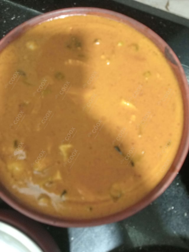 Tasty Red Thai Curry cooked by COOX chefs cooks during occasions parties events at home