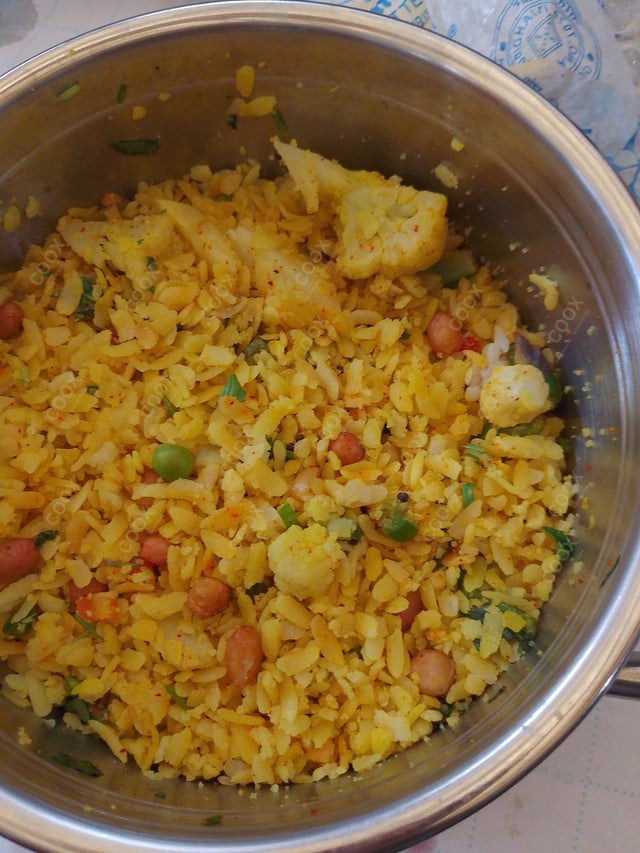 Tasty Poha cooked by COOX chefs cooks during occasions parties events at home