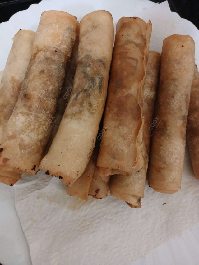 Tasty Chicken Spring Rolls cooked by COOX chefs cooks during occasions parties events at home
