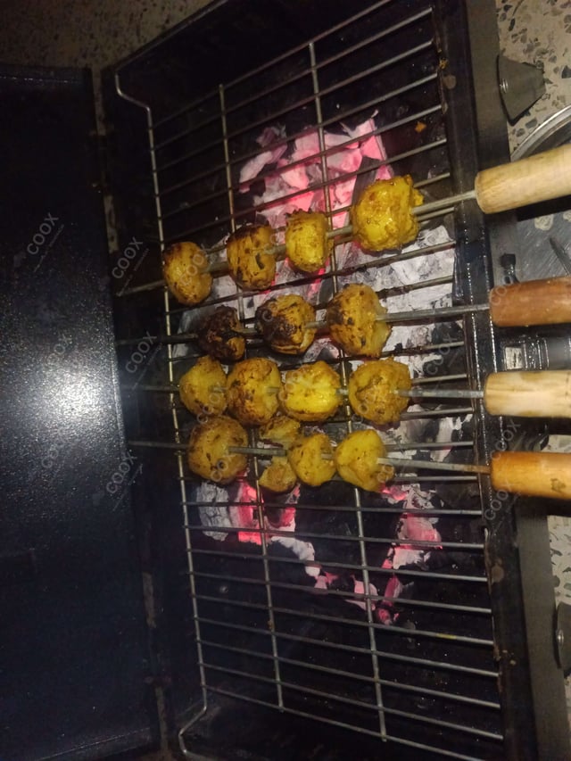 Tasty Tandoori Aloo cooked by COOX chefs cooks during occasions parties events at home