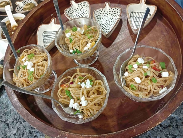 Tasty Spaghetti Aglio e Olio cooked by COOX chefs cooks during occasions parties events at home