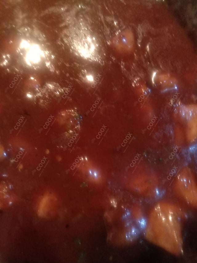 Tasty Chicken in Schezwan Sauce cooked by COOX chefs cooks during occasions parties events at home