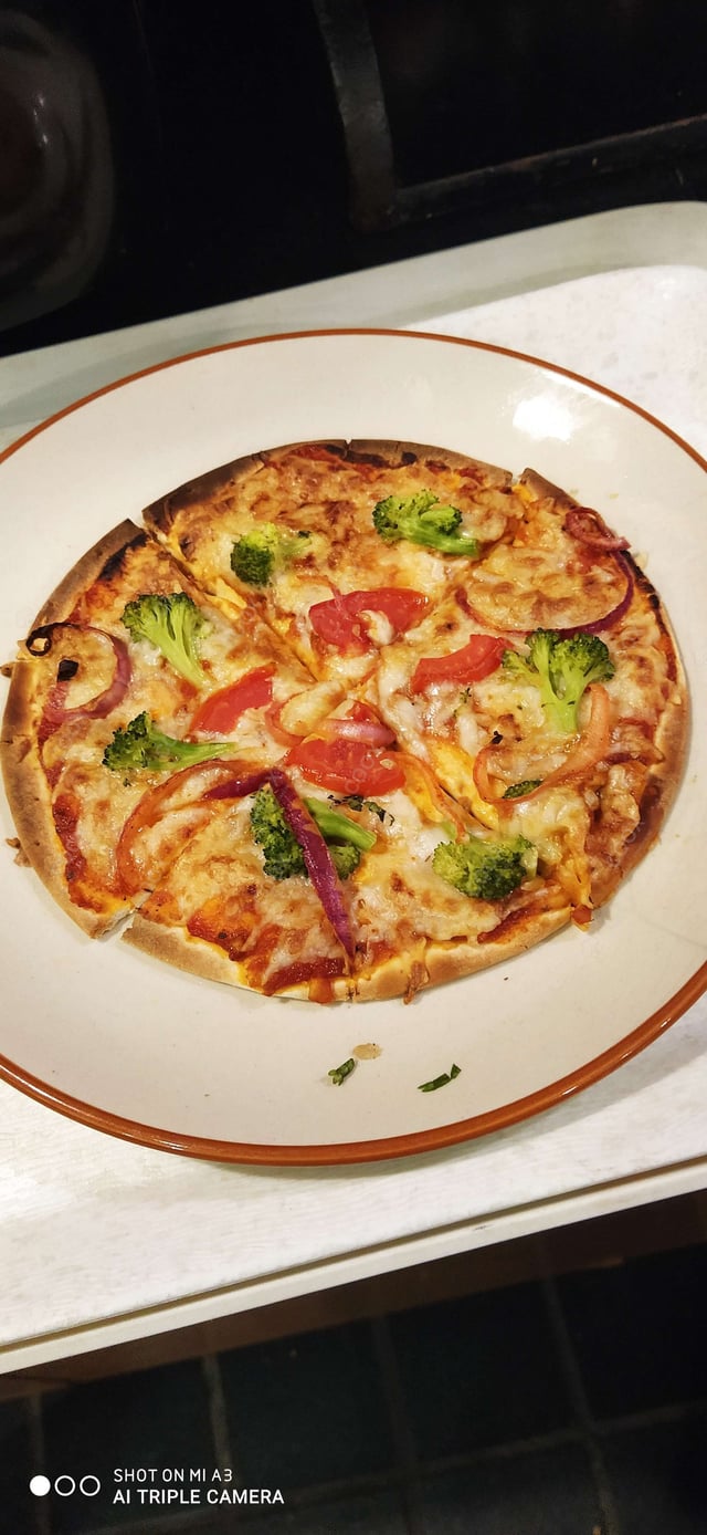 Tasty Chicken Pizza cooked by COOX chefs cooks during occasions parties events at home
