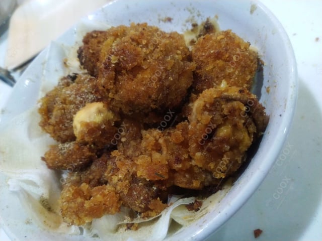 Tasty Mushroom Kurkure cooked by COOX chefs cooks during occasions parties events at home