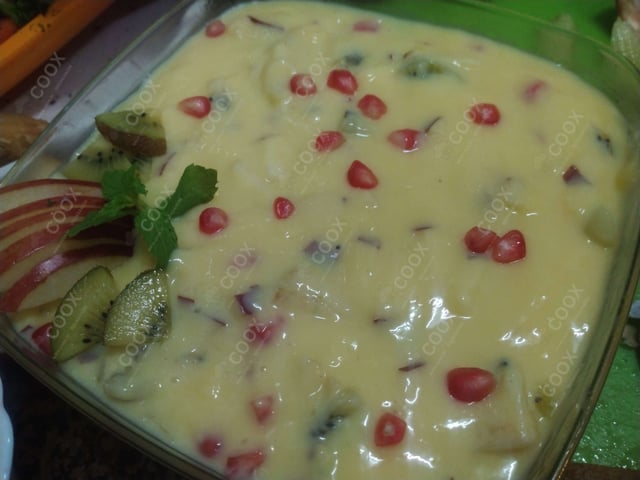 Tasty Fruit Custard cooked by COOX chefs cooks during occasions parties events at home