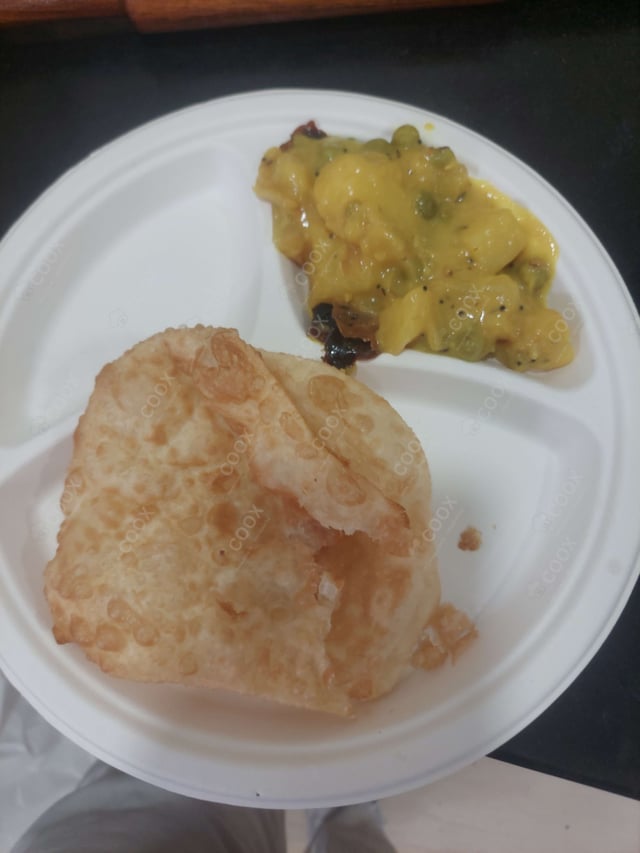 Delicious Poori Bhaji prepared by COOX