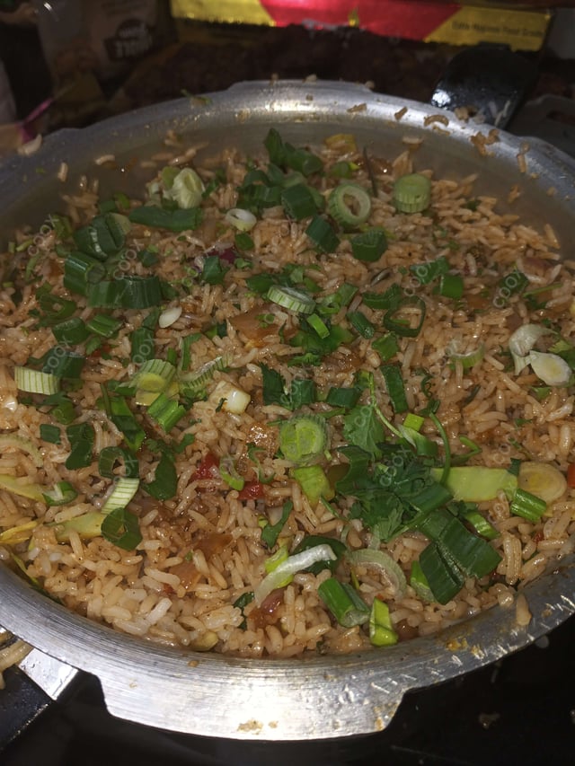 Delicious Veg Fried Rice prepared by COOX