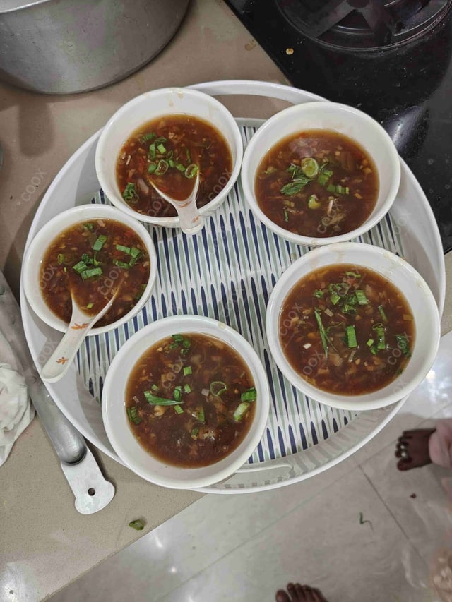 Tasty Hot & Sour Soup cooked by COOX chefs cooks during occasions parties events at home