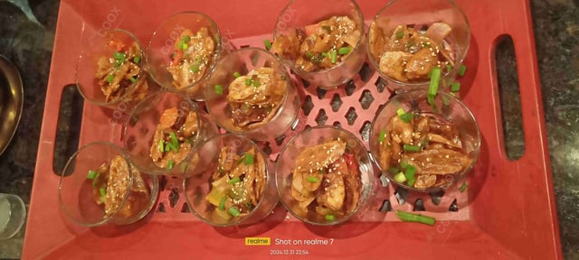 Tasty Chilli Lotus Stem cooked by COOX chefs cooks during occasions parties events at home