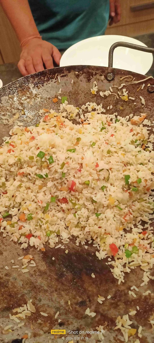 Tasty Burnt Garlic Rice cooked by COOX chefs cooks during occasions parties events at home