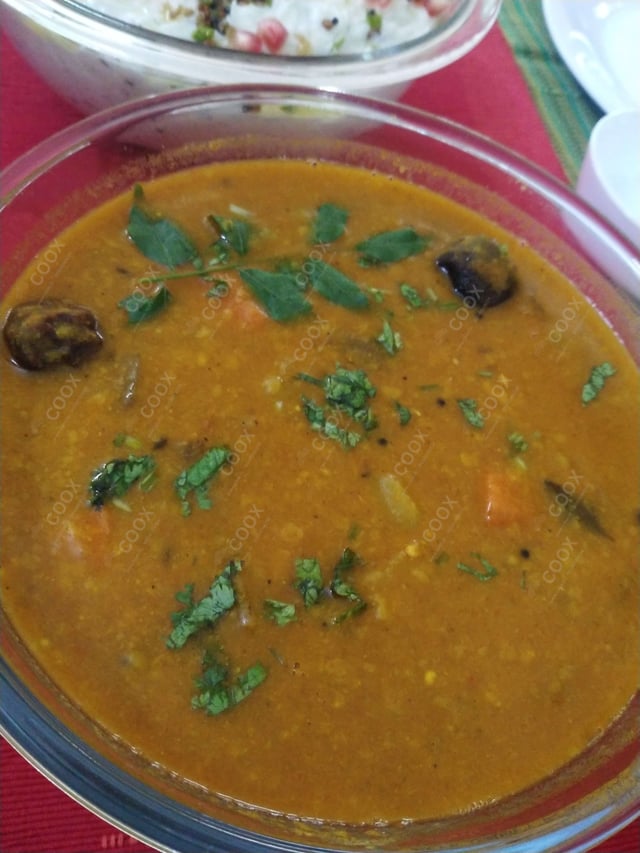 Tasty Sambhar cooked by COOX chefs cooks during occasions parties events at home