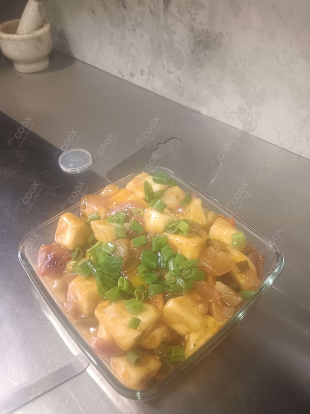 Delicious Chilli Paneer (Dry) prepared by COOX