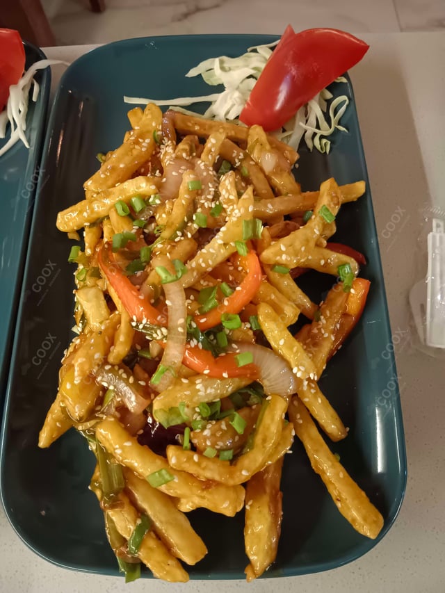 Delicious Honey Chilli Potato prepared by COOX