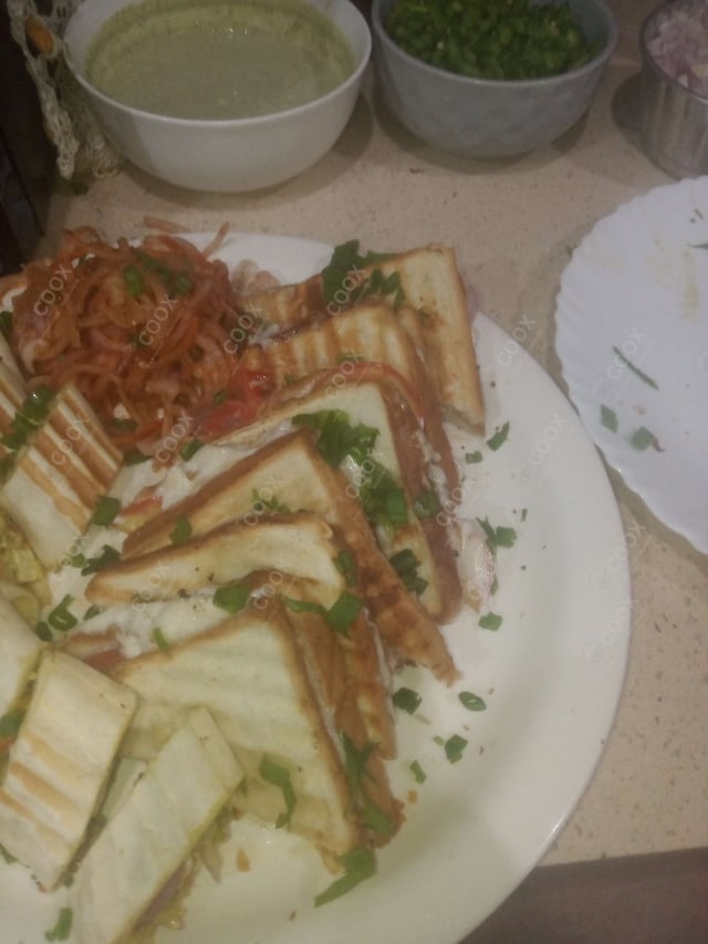 Tasty Grilled Veg Sandwiches cooked by COOX chefs cooks during occasions parties events at home