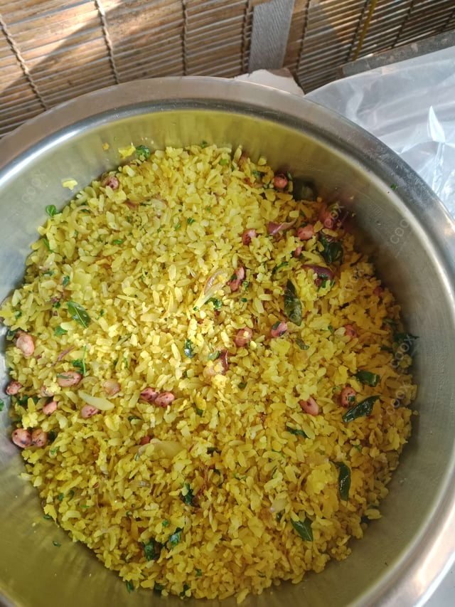 Tasty Poha cooked by COOX chefs cooks during occasions parties events at home