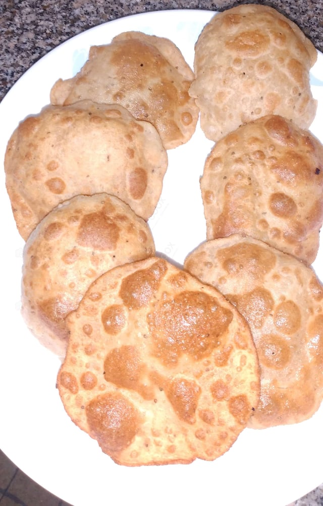 Tasty Pooris & Bedmis cooked by COOX chefs cooks during occasions parties events at home