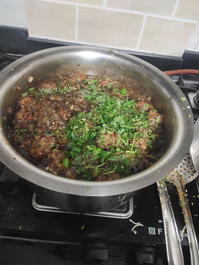 Delicious Veg Manchurian (Dry) prepared by COOX