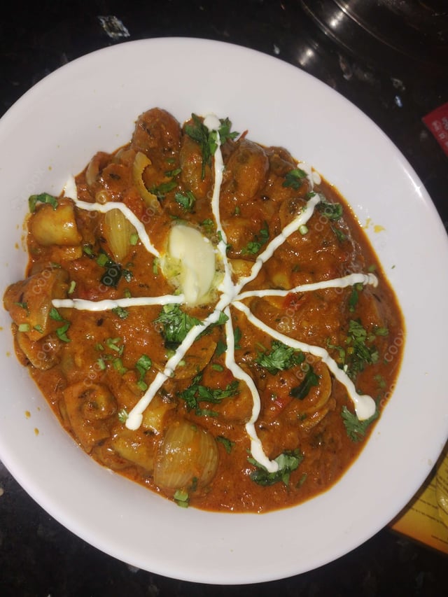 Tasty Mushroom do Pyaza cooked by COOX chefs cooks during occasions parties events at home