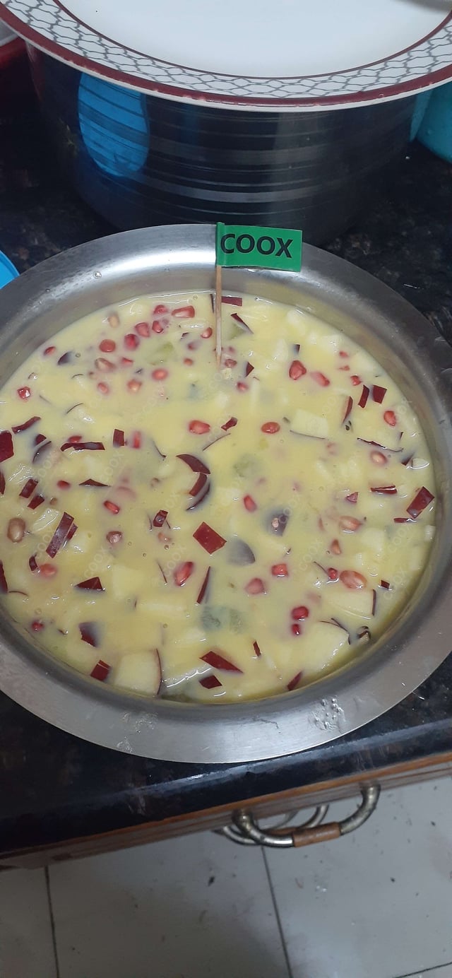 Tasty Fruit Custard cooked by COOX chefs cooks during occasions parties events at home